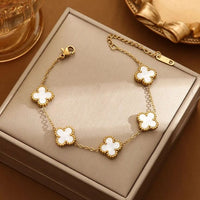 Pulsera Van Cleef rodinada unisex con dije de trébol de cuatro hojas en caja de regalo elegante