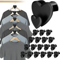 Set de ganchos ahorradores de espacio para ropa optimizando armarios.